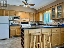 Crisp, clean solid wood kitchen. - 