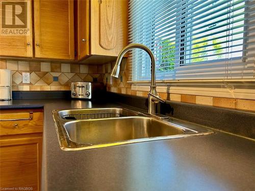 Double sinks and water view. - 5 Mill Point Road, North Bruce Peninsula, ON - Indoor Photo Showing Kitchen With Double Sink