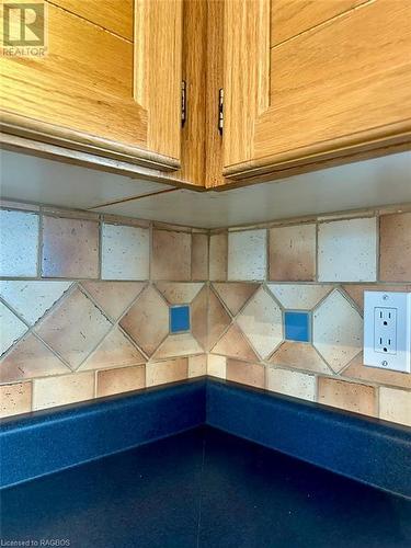 Tile backsplash detail and nautical blue counters. - 5 Mill Point Road, North Bruce Peninsula, ON - Indoor