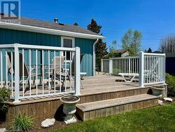 Over 650 sq ft of newer wrap-around, maintenance-free decking with aluminum railing system. - 