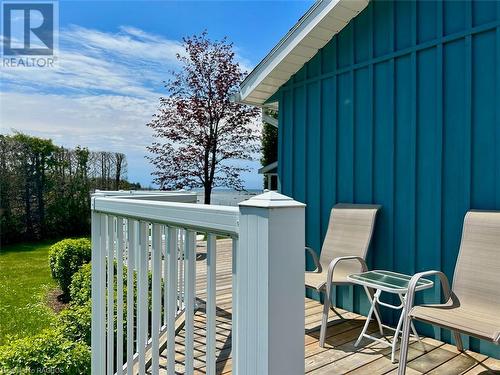 Low maintenance exterior including board/batten siding, aluminum soffit and fascia and newer roof offers more time to just enjoy waterfront cottage life. - 5 Mill Point Road, North Bruce Peninsula, ON - Outdoor