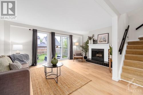 130 Sherway Drive, Ottawa, ON - Indoor Photo Showing Living Room With Fireplace