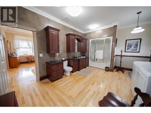 120 Wattsville Road, Cranbrook, BC - Indoor Photo Showing Bedroom With Fireplace