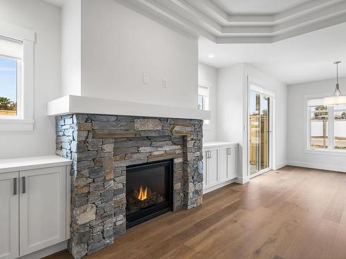 540 Rainbow Way, Parksville, BC - Indoor Photo Showing Living Room With Fireplace