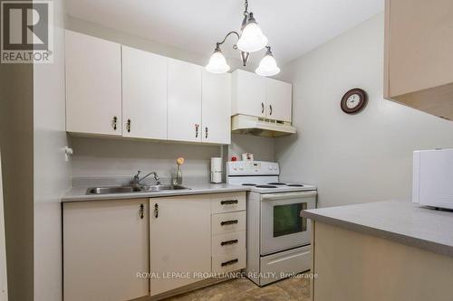 103 - 175 Haig Road, Belleville, ON - Indoor Photo Showing Kitchen With Double Sink