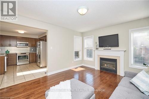16 Durham Way, Niagara-On-The-Lake, ON - Indoor Photo Showing Living Room With Fireplace