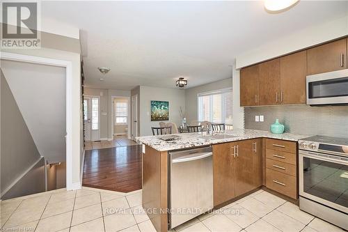 16 Durham Way, Niagara-On-The-Lake, ON - Indoor Photo Showing Kitchen With Double Sink