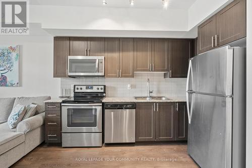908 - 7890 Bathurst Street, Vaughan, ON - Indoor Photo Showing Kitchen With Double Sink