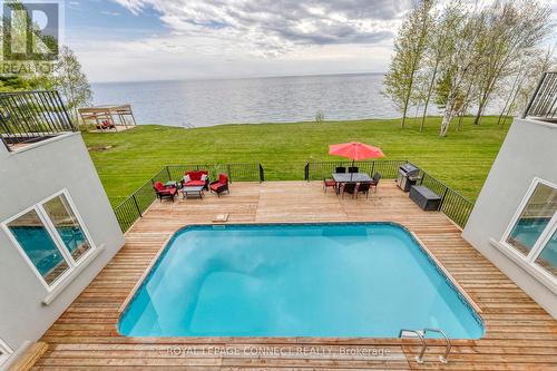 401 Lakeshore Road, Alnwick/Haldimand, ON - Outdoor With Body Of Water With In Ground Pool With Deck Patio Veranda