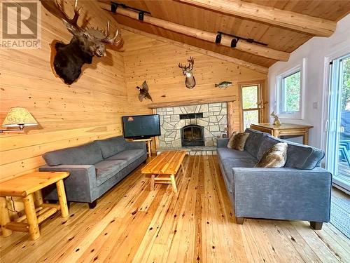 241 Maple Lane, Mindemoya, Manitoulin Island, ON - Indoor Photo Showing Living Room With Fireplace