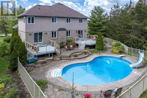 39 Yuill Crescent, Prince Edward County, ON - Outdoor With In Ground Pool With Deck Patio Veranda With Backyard With Exterior