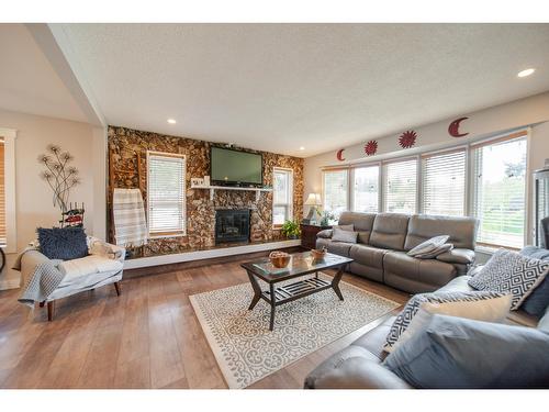 2308 6Th Street N, Cranbrook, BC - Indoor Photo Showing Living Room With Fireplace