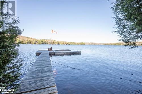 Standing on deck towards end of dock - 1016 Pegg Drive, Haliburton, ON - Outdoor With Body Of Water With View