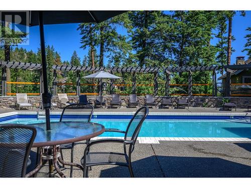251 Predator Ridge Drive Unit# 12, Vernon, BC - Outdoor With In Ground Pool With Backyard