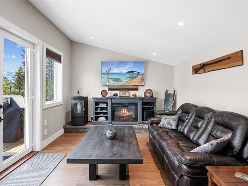 8156 Hwy #23 Highway, Revelstoke, BC - Indoor Photo Showing Living Room With Fireplace