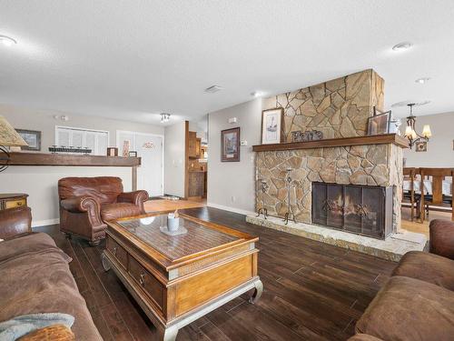960 Augusta Court, Kelowna, BC - Indoor Photo Showing Living Room With Fireplace