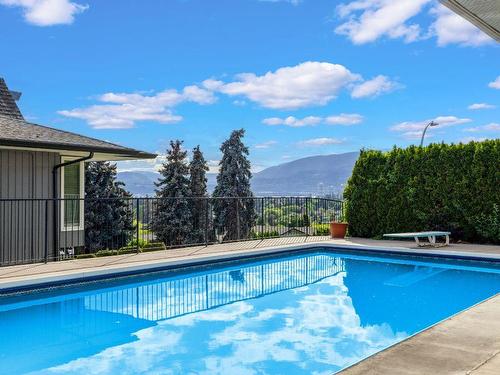 960 Augusta Court, Kelowna, BC - Outdoor With In Ground Pool With Backyard