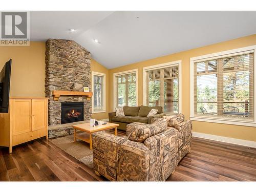 251 Predator Ridge Drive Unit# 47, Vernon, BC - Indoor Photo Showing Living Room With Fireplace