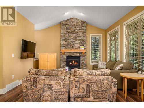 251 Predator Ridge Drive Unit# 47, Vernon, BC - Indoor Photo Showing Living Room With Fireplace