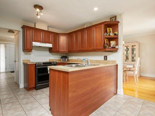 Cuisine - 1069 Rue Des Crocus, Laval (Sainte-Dorothée), QC - Indoor Photo Showing Kitchen With Double Sink