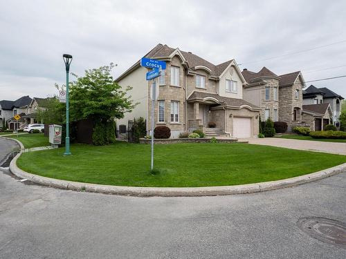 ExtÃ©rieur - 1069 Rue Des Crocus, Laval (Sainte-Dorothée), QC - Outdoor With Facade