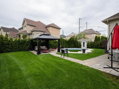 Cour - 1069 Rue Des Crocus, Laval (Sainte-Dorothée), QC - Outdoor With Backyard