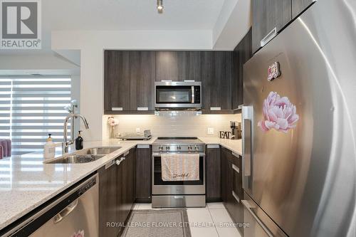 709 - 65 Watergarden Drive, Mississauga, ON - Indoor Photo Showing Kitchen With Double Sink With Upgraded Kitchen