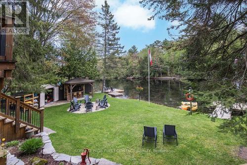 7697 West River Road, Ramara, ON - Outdoor With Backyard