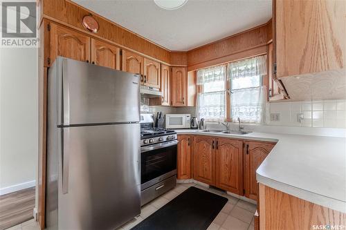 64 Willoughby Crescent, Regina, SK - Indoor Photo Showing Kitchen With Double Sink