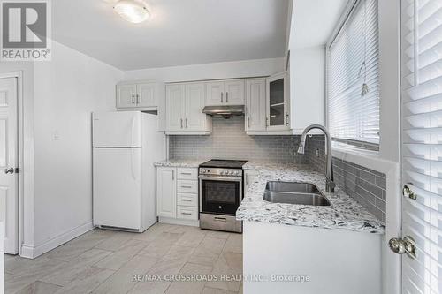 1074 Lawrence Avenue E, Toronto, ON - Indoor Photo Showing Kitchen With Double Sink With Upgraded Kitchen
