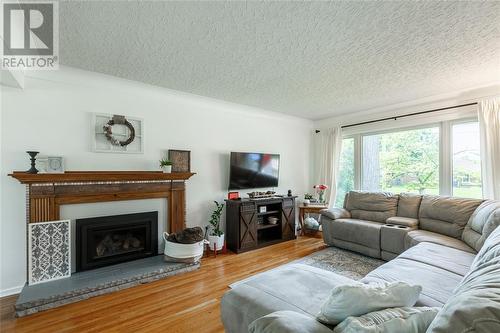 1080 Bel Aire Drive, Sarnia, ON - Indoor Photo Showing Living Room With Fireplace