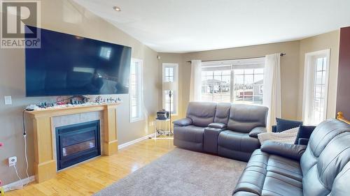 11416 103 Street, Fort St. John, BC - Indoor Photo Showing Living Room With Fireplace