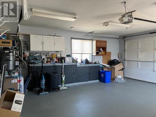 102 1St Street, Vernon, BC - Indoor Photo Showing Garage