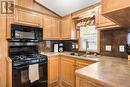42 - 6047 Highway 89, New Tecumseth, ON  - Indoor Photo Showing Kitchen With Double Sink 