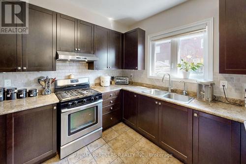 86 Chokecherry Crescent, Markham, ON - Indoor Photo Showing Kitchen With Double Sink