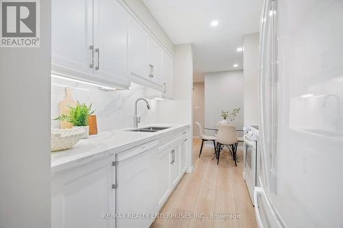 207 - 2055 Walkers Line, Burlington, ON - Indoor Photo Showing Kitchen With Double Sink