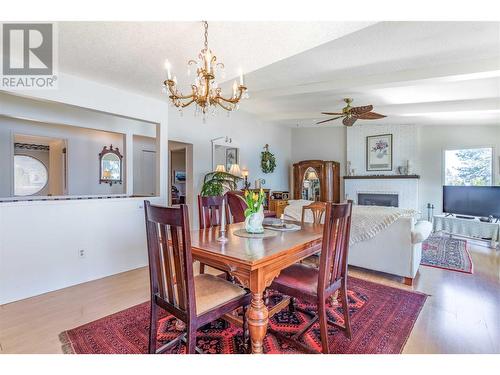 2083 Manuel Road, West Kelowna, BC - Indoor Photo Showing Dining Room With Fireplace