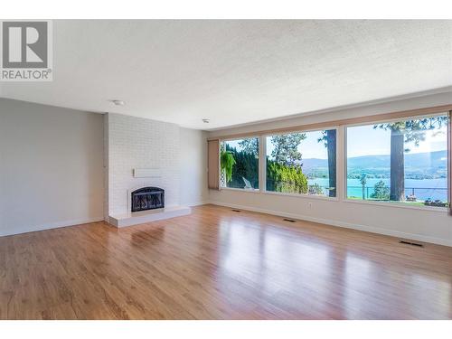 2083 Manuel Road, West Kelowna, BC - Indoor Photo Showing Living Room With Fireplace