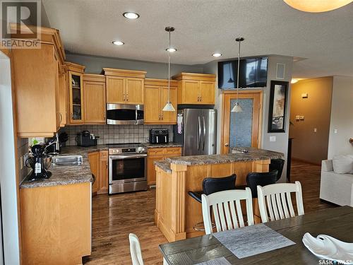 10 Manor Bay, Carlyle, SK - Indoor Photo Showing Kitchen With Double Sink