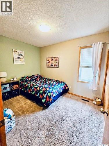 10 Manor Bay, Carlyle, SK - Indoor Photo Showing Bedroom