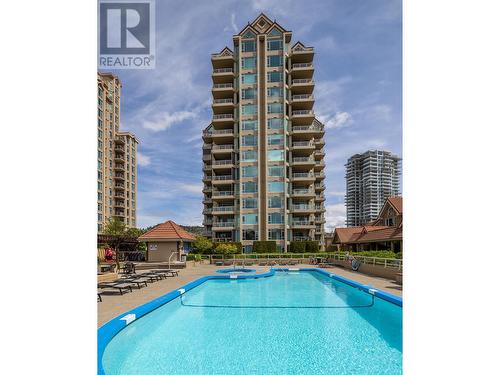 1156 Sunset Drive Unit# 113, Kelowna, BC - Outdoor With In Ground Pool With Facade