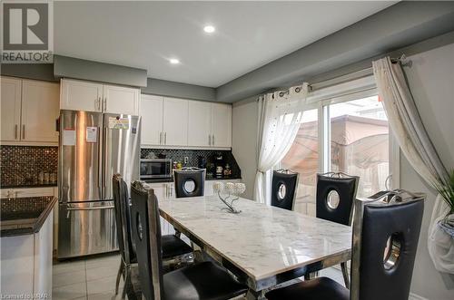 Dining room and kitchen. - 237 Shady Glen Crescent, Kitchener, ON - Indoor Photo Showing Kitchen