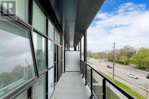 310 - 50 George Butchart Drive, Toronto, ON - Outdoor With Balcony With Exterior