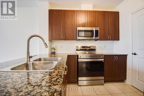 516 - 383 Main Street E, Milton, ON - Indoor Photo Showing Kitchen With Double Sink