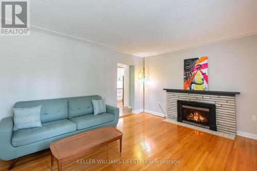 44 Tweedsmuir Avenue, London, ON - Indoor Photo Showing Living Room With Fireplace