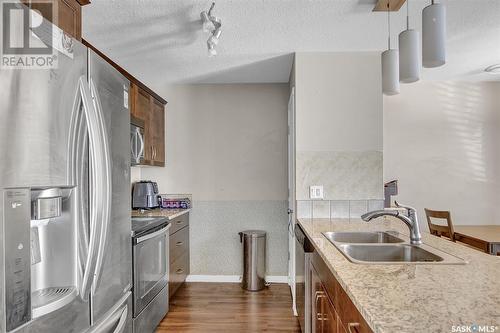 503 3440 Avonhurst Drive, Regina, SK - Indoor Photo Showing Kitchen With Double Sink