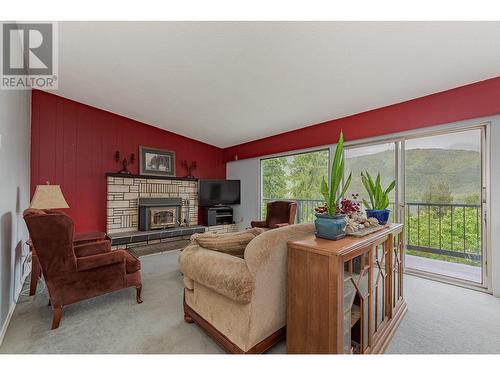 101 Mann Road, Sicamous, BC - Indoor Photo Showing Living Room With Fireplace