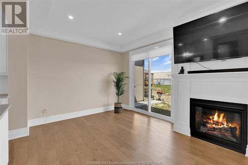 144 Lane Street, Essex, ON - Indoor Photo Showing Living Room With Fireplace