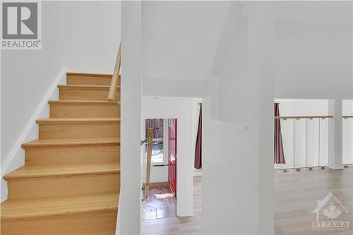 New hardwood stairs everywhere. No carpets :) - 119 Royalton Private, Ottawa, ON - Indoor Photo Showing Other Room