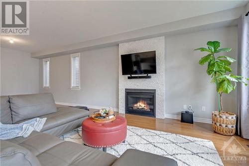 591 Vivera Place, Stittsville, ON - Indoor Photo Showing Living Room With Fireplace
